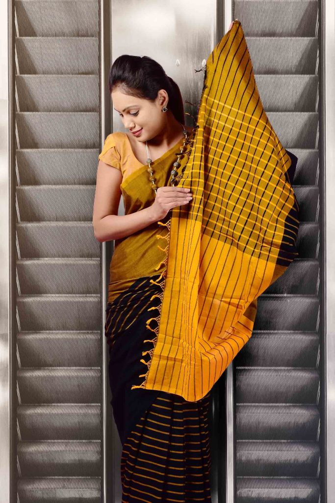 mustard yellow with black linear design handloom saree